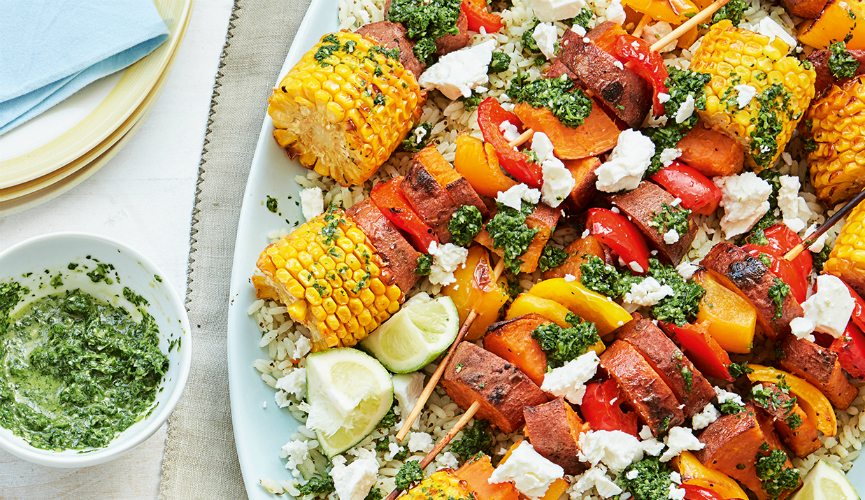 Veggie kebab platter with chimichurri sauce