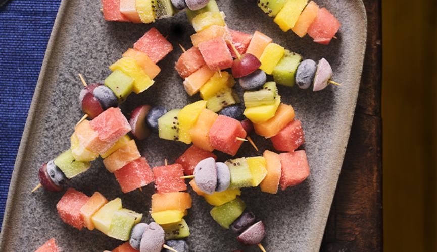 Rainbow frozen fruit kebabs